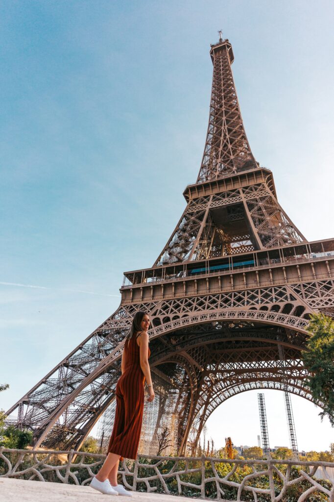 Woman contemplating the Eiffel tower in Paris